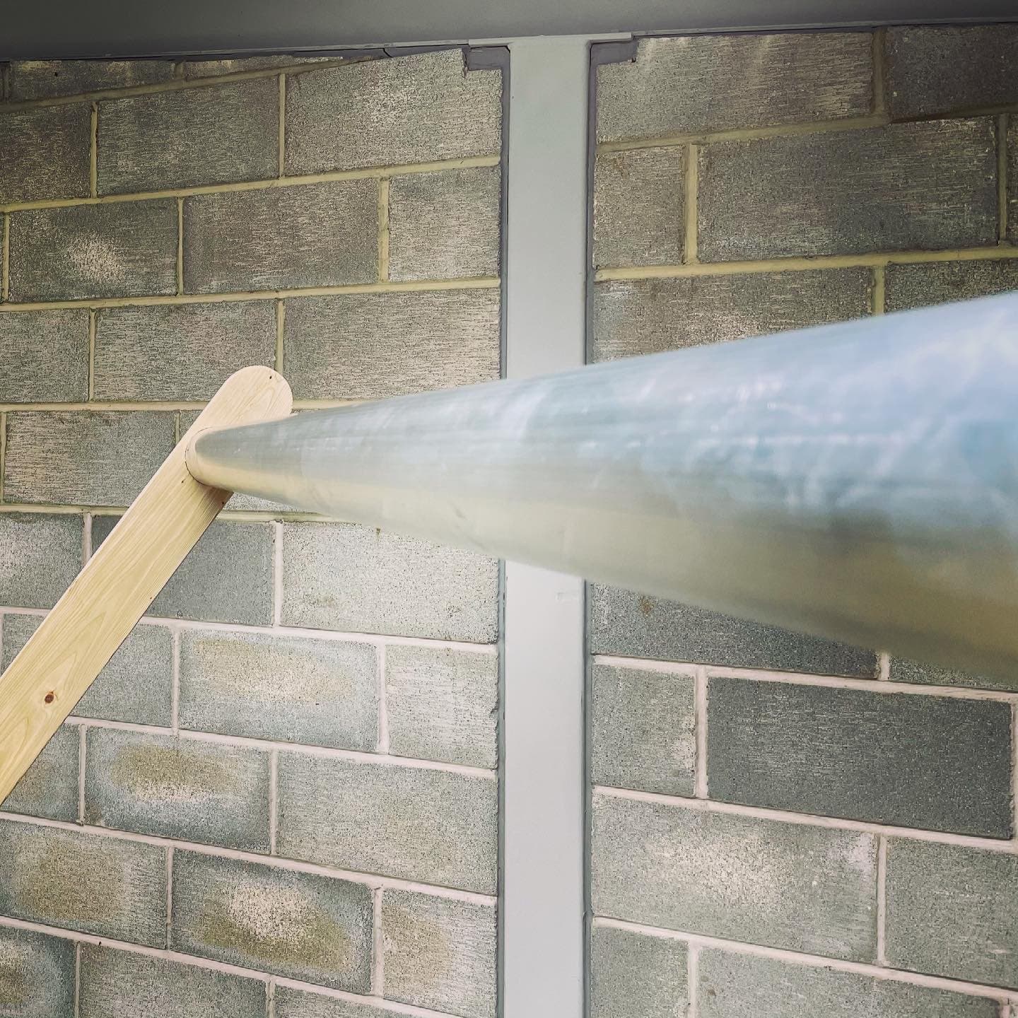 Aluminium sling pole close-up on a giant deckchair